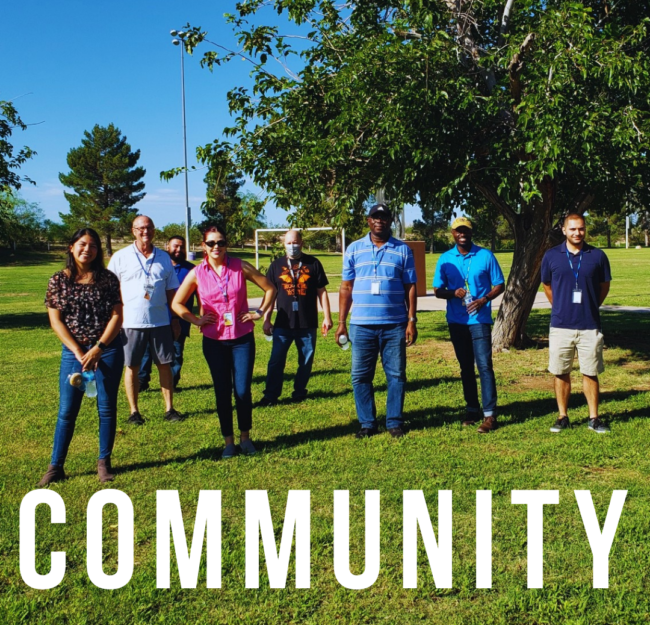 image of group of people at a grassy park